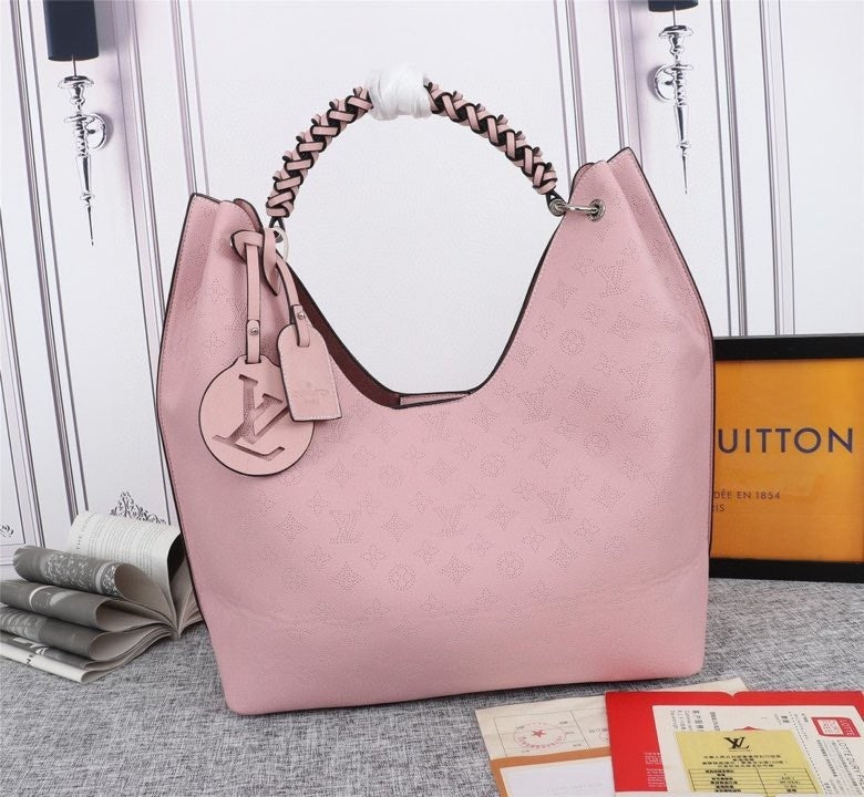 Monogram Taurin Handbags
