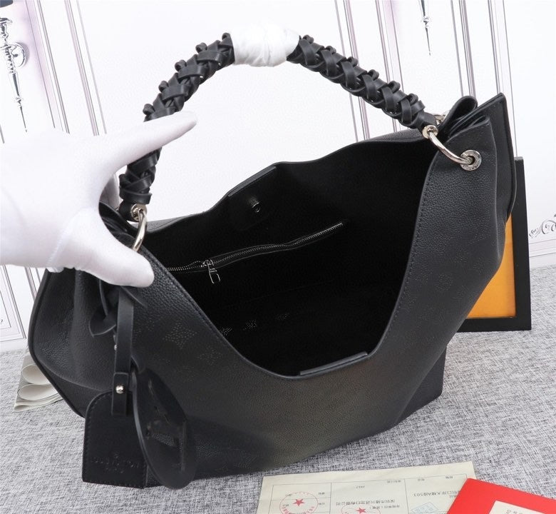 Monogram Taurin Handbags