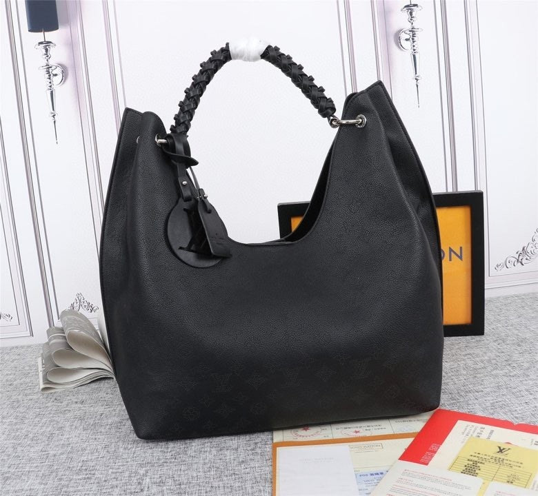 Monogram Taurin Handbags