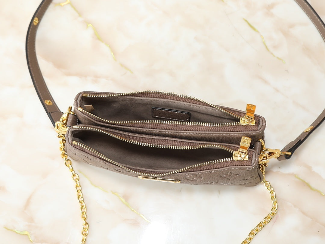 Tan Monogram On the Go Mini Bag