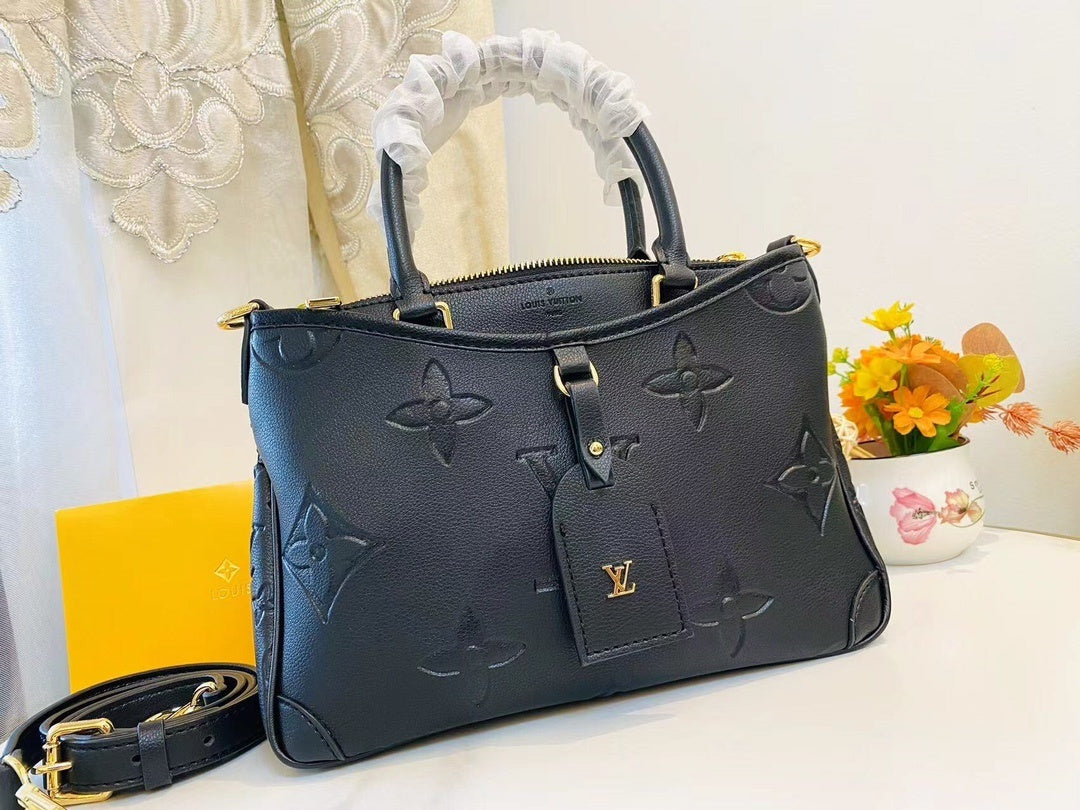 Monogram Tria Shoulder Bags