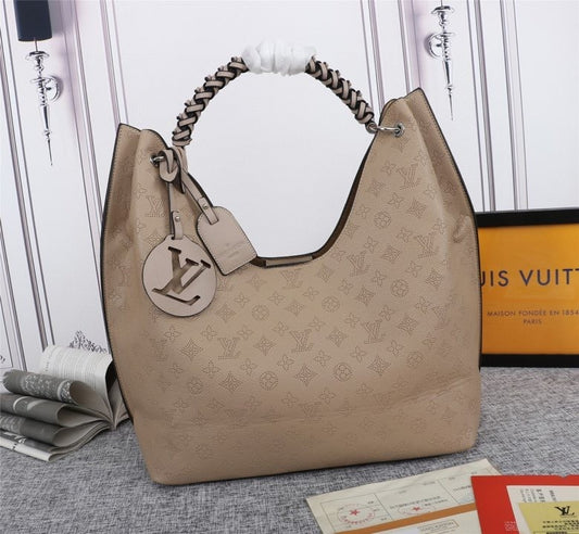 Monogram Taurin Handbags