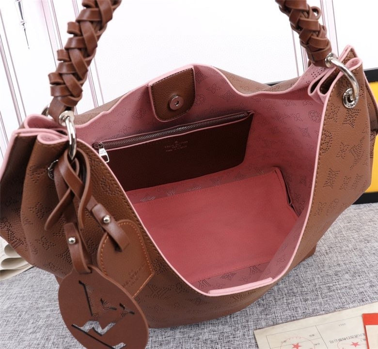 Monogram Taurin Handbags