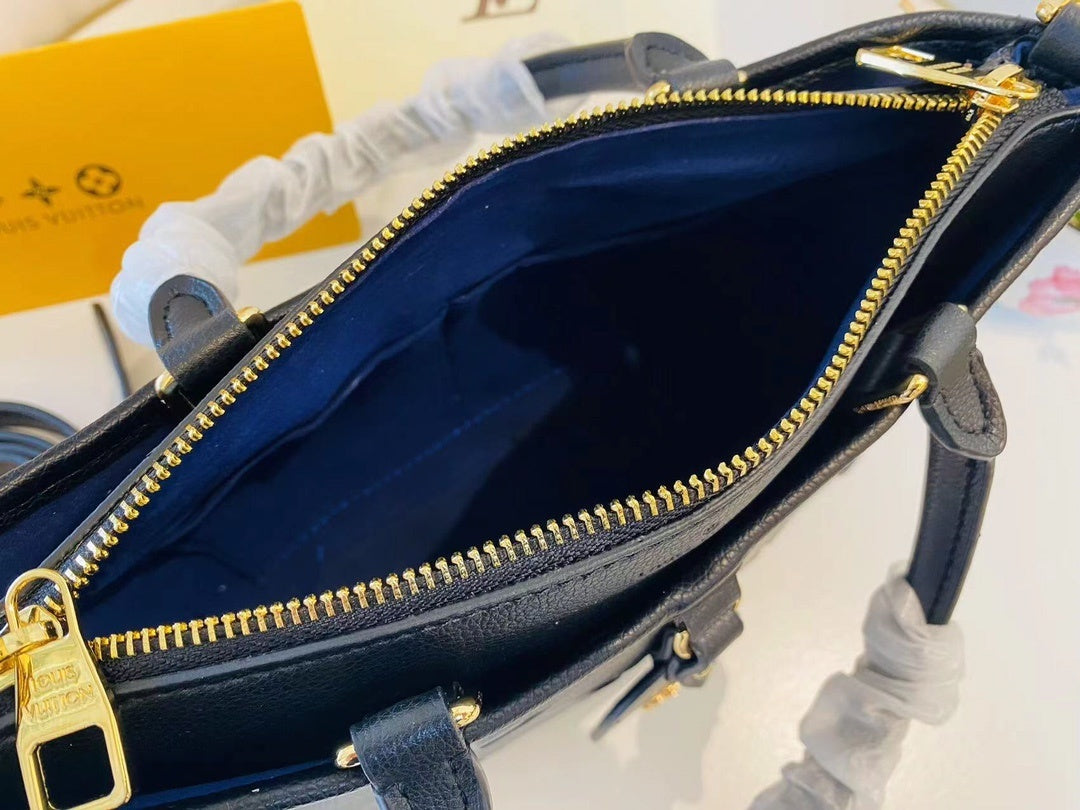 Monogram Tria Shoulder Bags