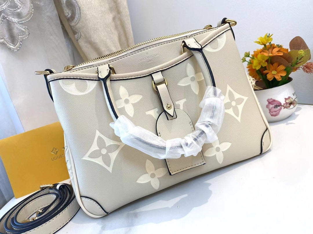 Monogram Tria Shoulder Bags