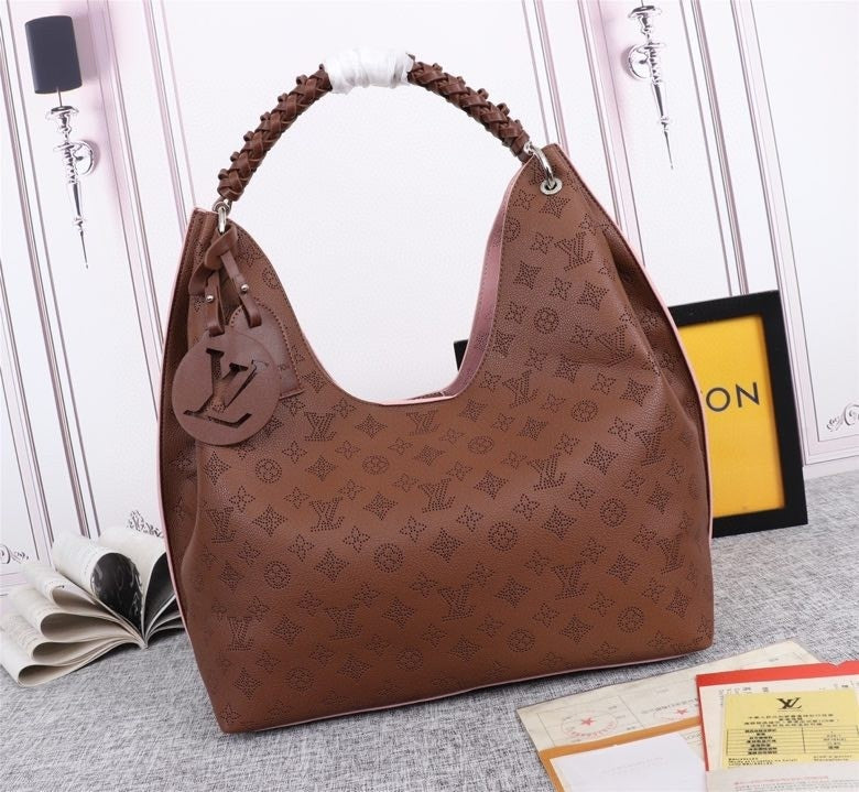 Monogram Taurin Handbags
