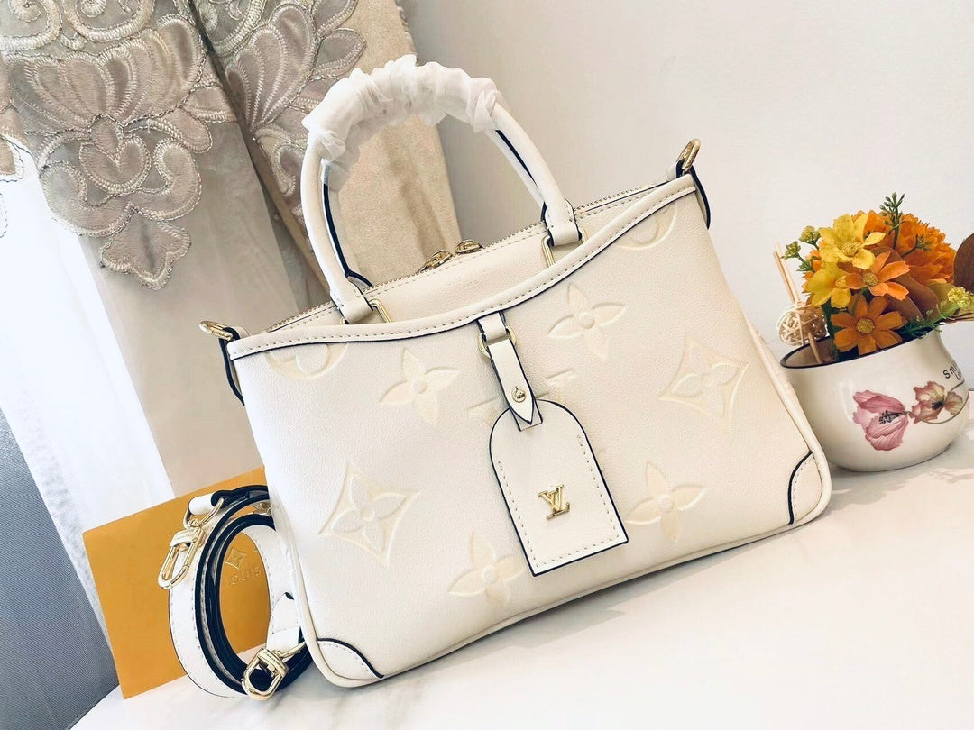 Monogram Tria Shoulder Bags