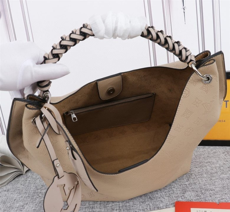 Monogram Taurin Handbags
