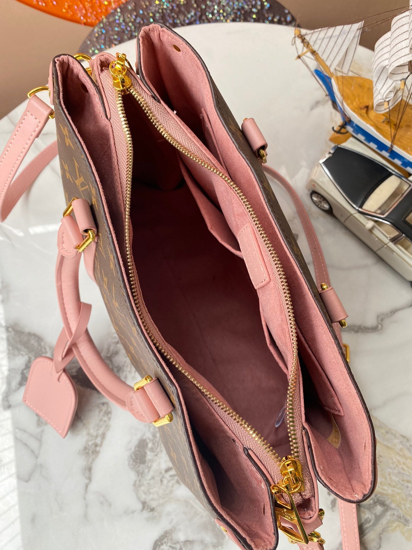 Monogram Slim Evie Bags
