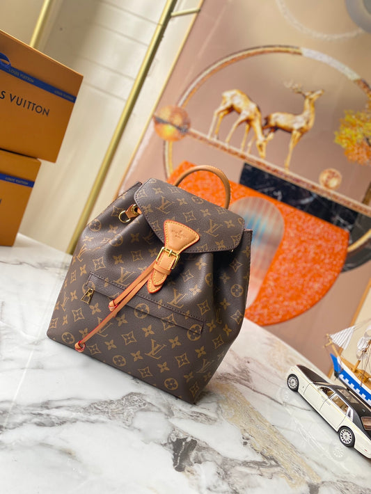 Monogram Sleek Mini City Backpacks