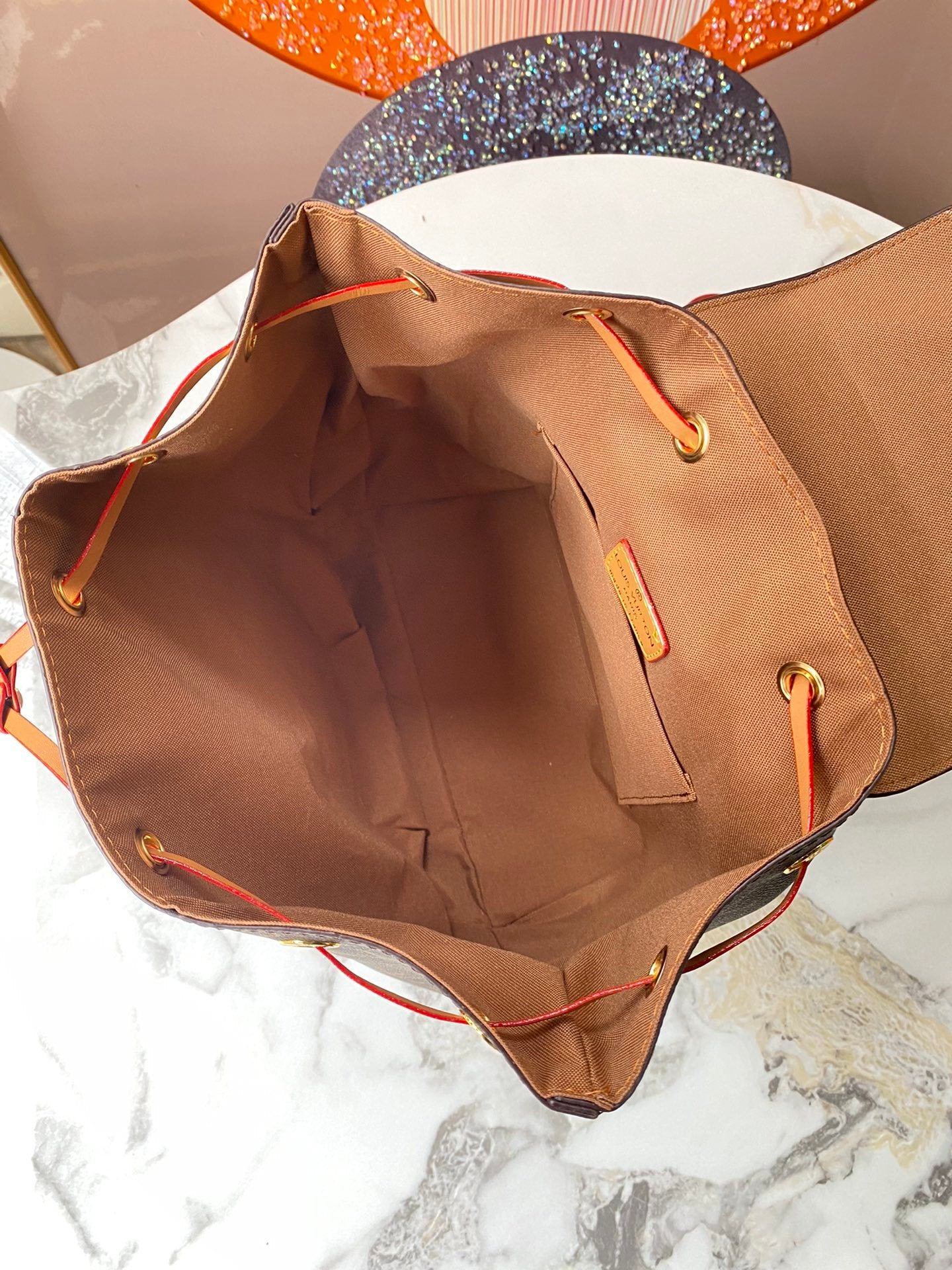 Monogram Sleek Mini City Backpacks