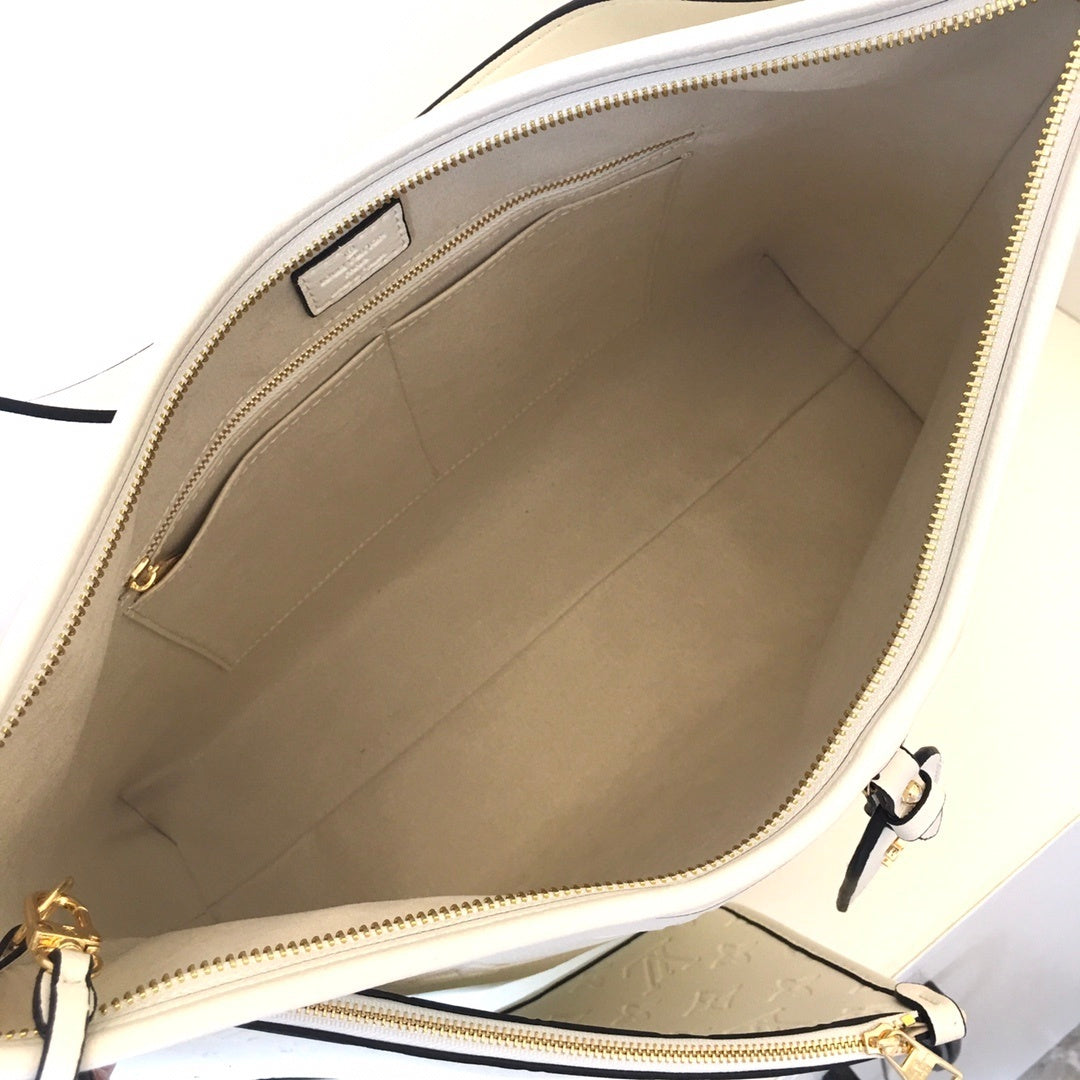 Monogram Mini Curve Carryalls