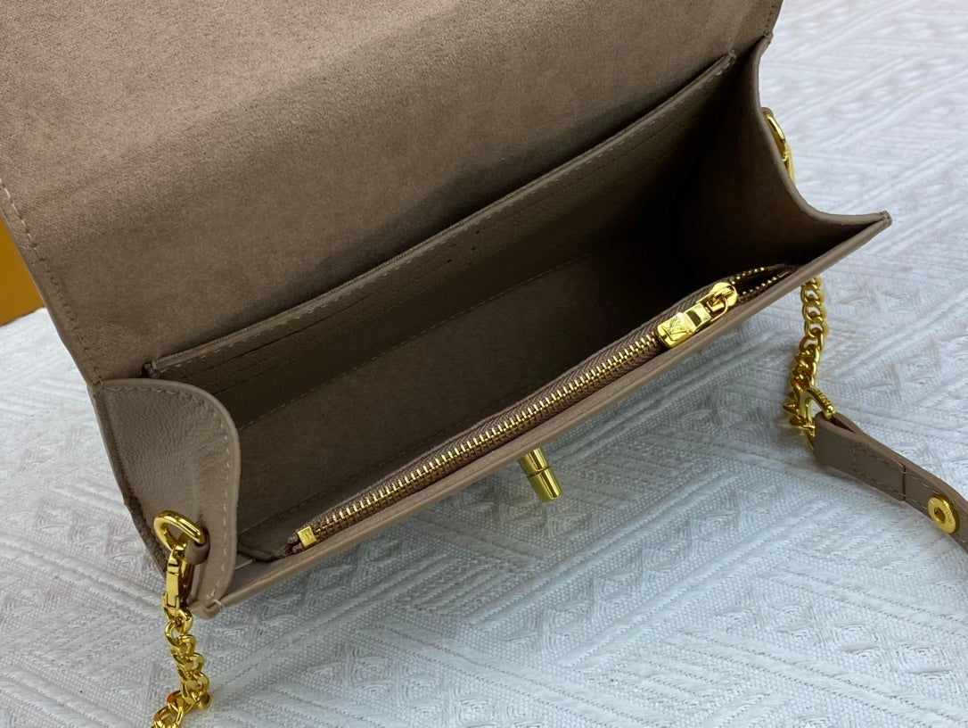 Monogram Lock Me Shoulder Bags