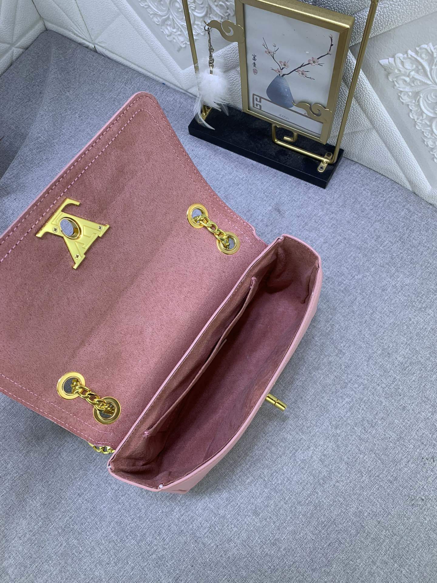 Monogram Lock EW Shoulder Bags