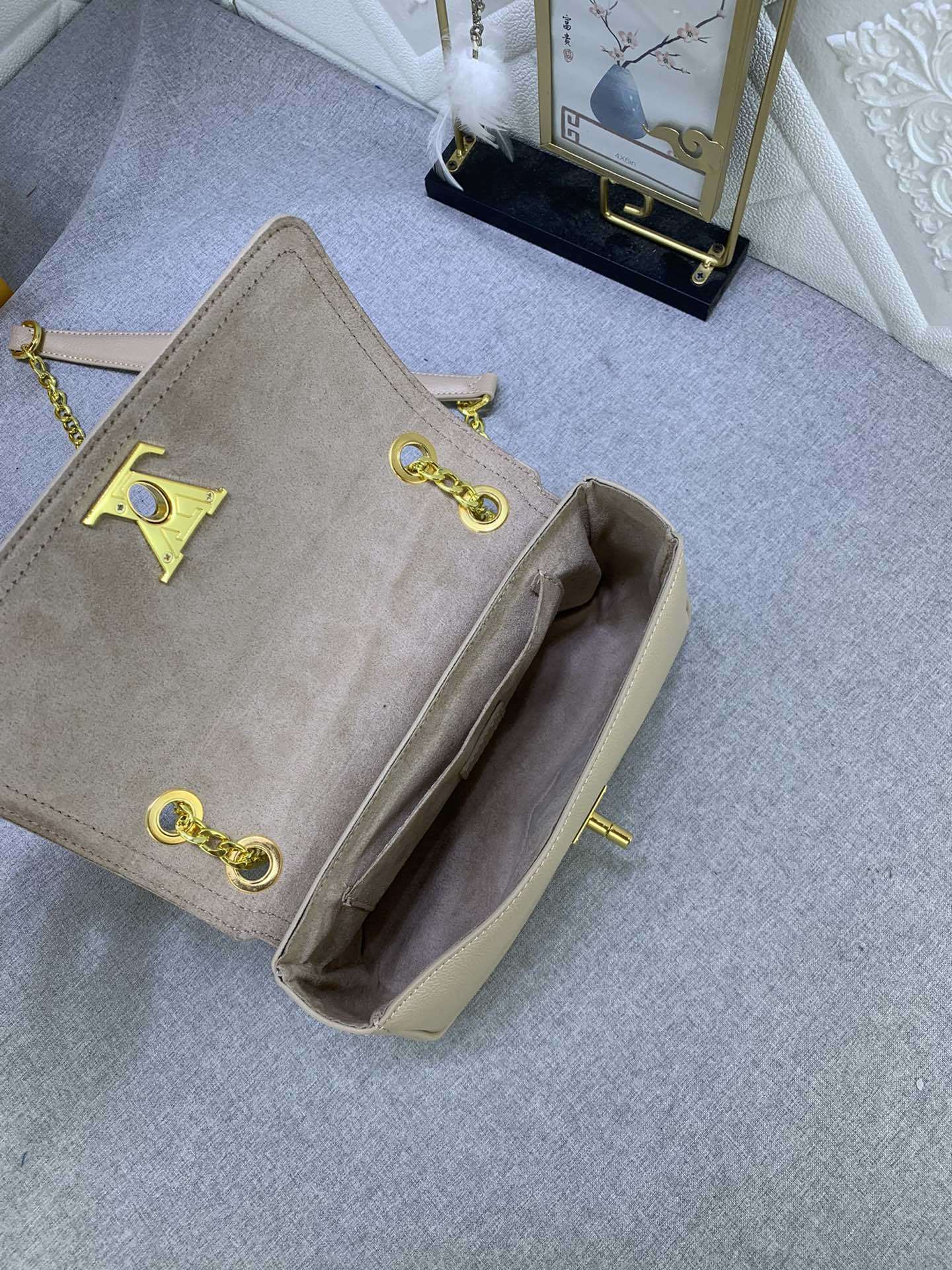 Monogram Lock EW Shoulder Bags