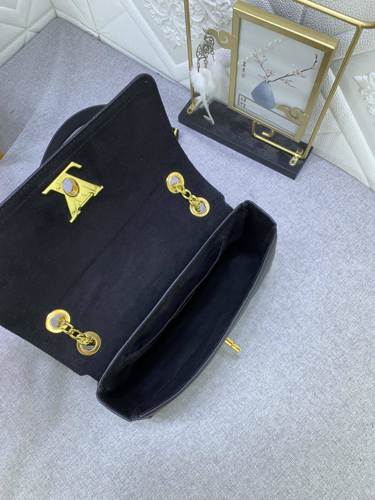 Monogram Lock EW Shoulder Bags